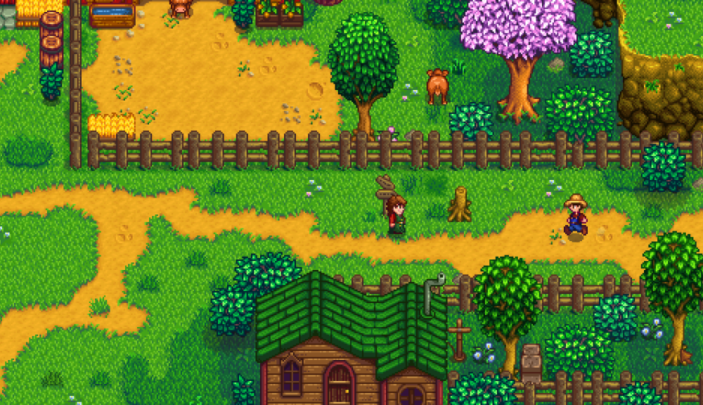 Official Stardew Valley gameplay screenshot showing the farm and village scenery, used for the PS5 compatibility guide