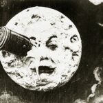 A real 1902 frame from Georges Méliès's A Trip to the Moon depicting the rocket in the eye of the Moon