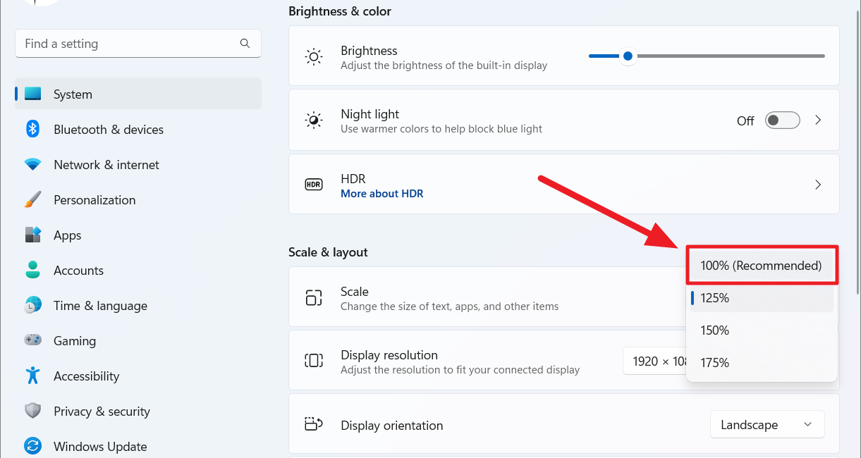 Windows 11 Display settings showing Scale and layout percentages for text and app size