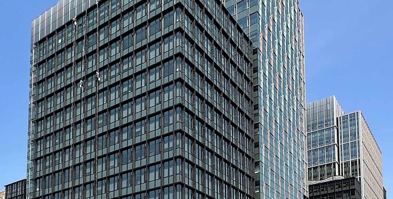 Amazon HQ2 office buildings photographed in 2026, illustrative of Amazon corporate operations