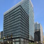 Amazon HQ2 office buildings photographed in 2026, illustrative of Amazon corporate operations