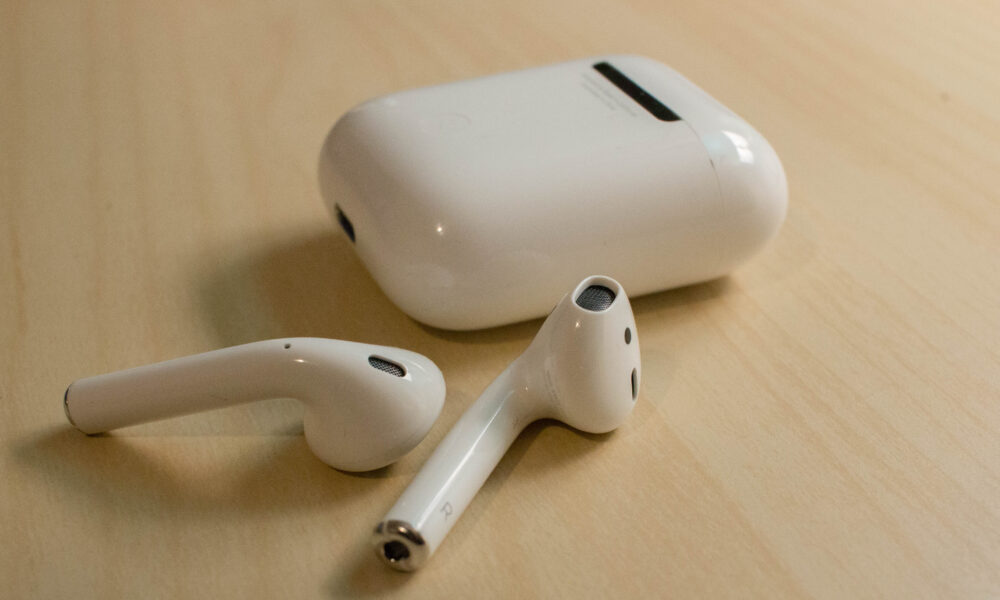 Real pair of Apple AirPods wireless earbuds