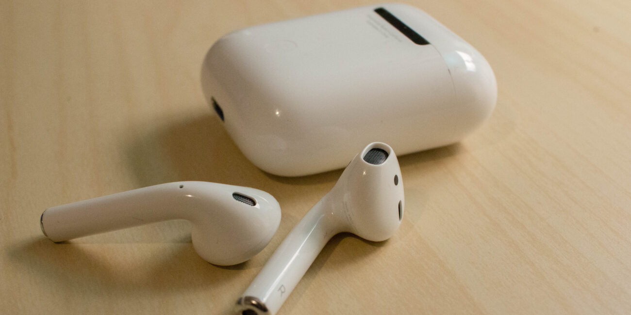 Real pair of Apple AirPods wireless earbuds