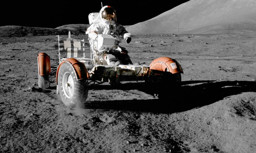 Actual Apollo 17 NASA astronaut Gene Cernan with the lunar rover on the Moon, December 12, 1972
