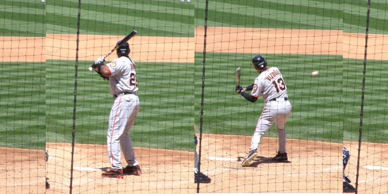 Barry Bonds swinging a baseball bat during a game in Seattle