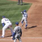 Los Angeles Dodgers runner Dee Gordon stealing a base against the Chicago Cubs in 2014