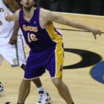 Pau Gasol establishes rebounding position and boxes out an opponent in an NBA game