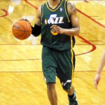 Utah Jazz player Trey Burke dribbling against the Houston Rockets in a 2014 NBA game