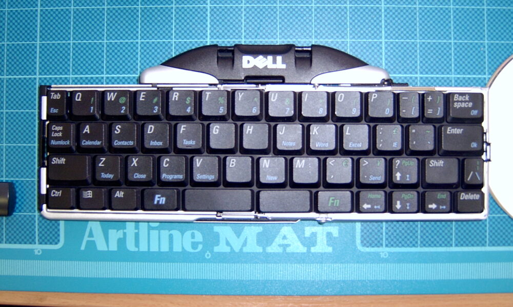Real photograph of a Dell wireless Bluetooth computer keyboard