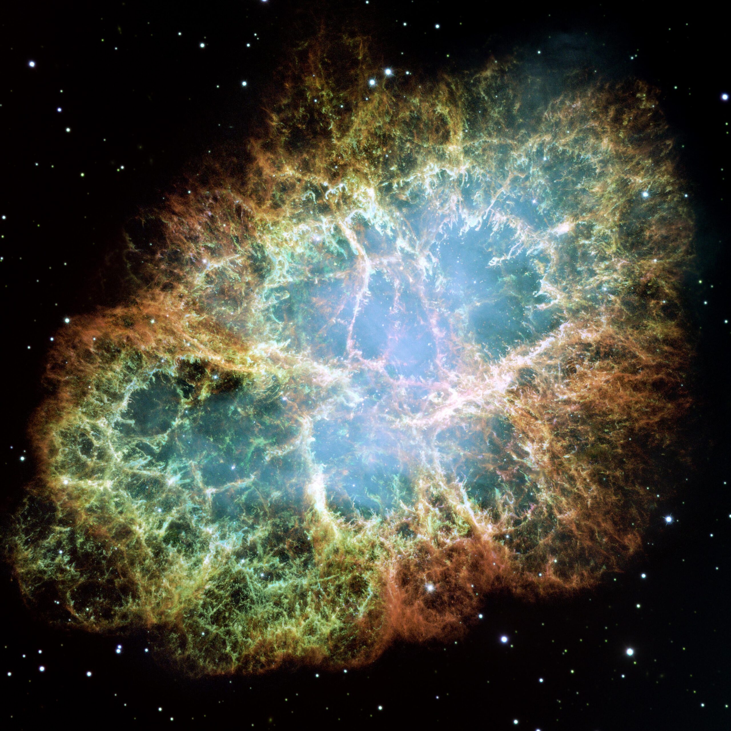 Authentic NASA ESA 2005 Hubble photo of Crab Nebula M1 showing dense multicolored explosion filaments and central pulsar region