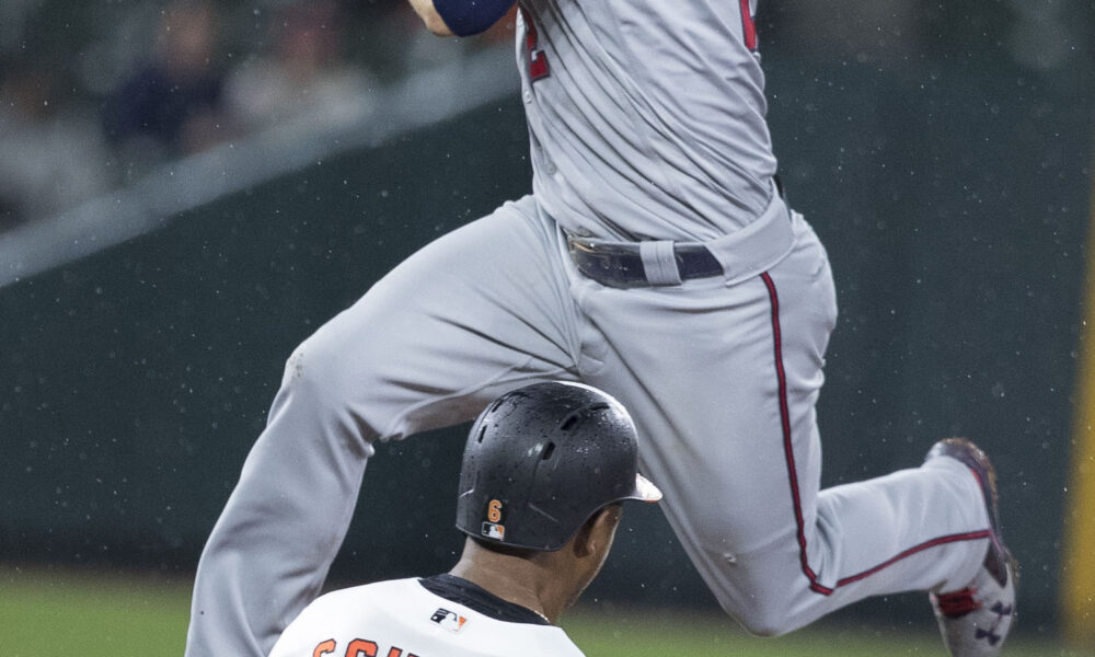 Second baseman Brian Dozier attempting a double play at second base