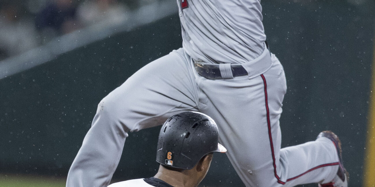 Second baseman Brian Dozier attempting a double play at second base