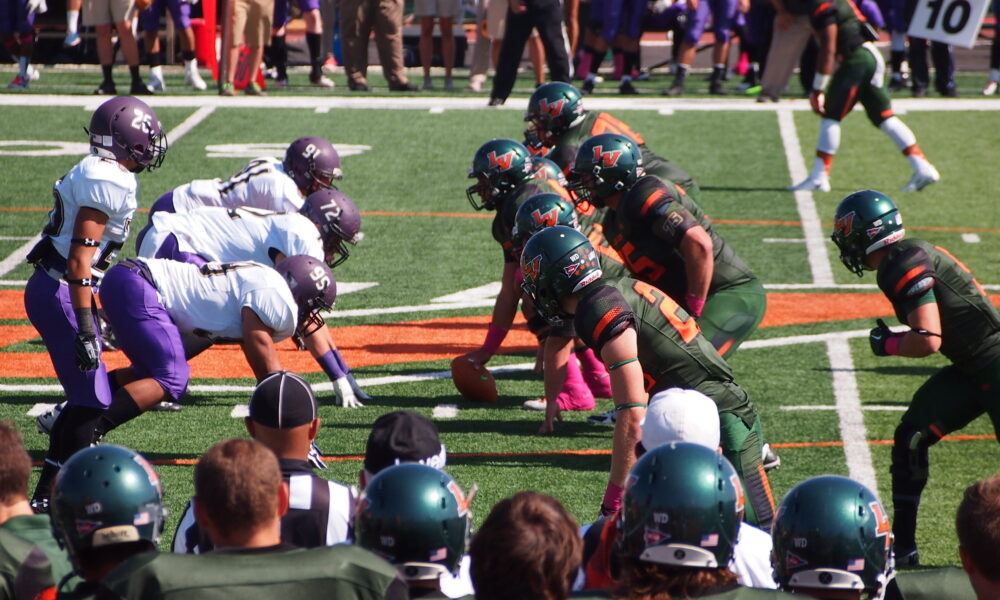 American football teams before a snap