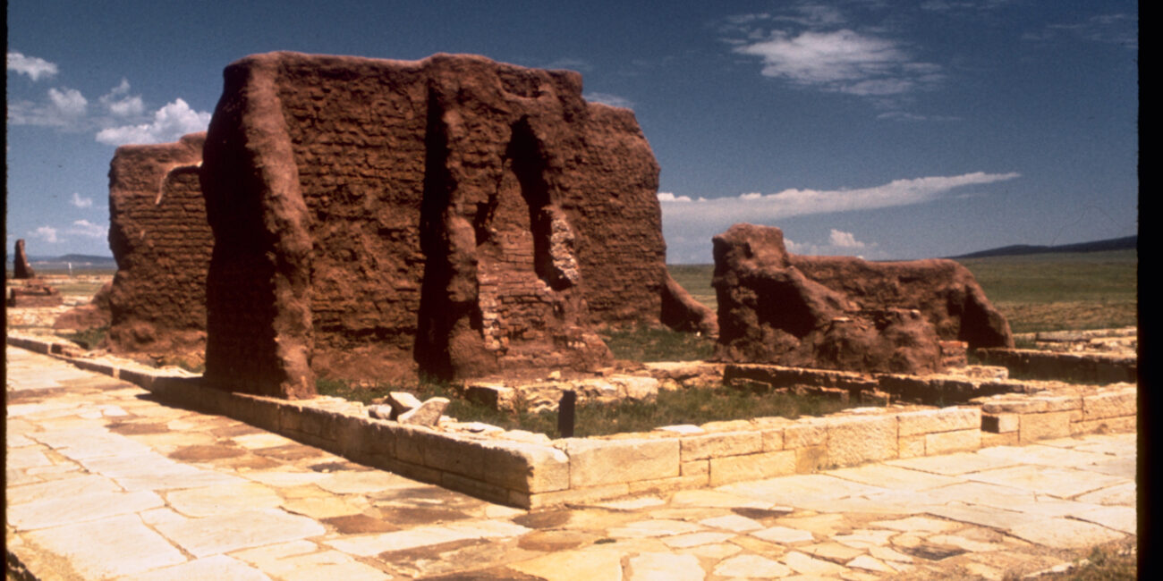 Original adobe walls and stone walking path at Fort Union National Monument, New Mexico