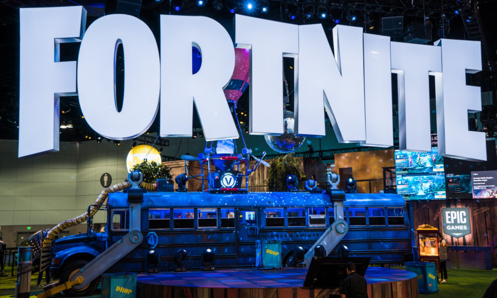 Fortnite presentation at E3 2018 illustrating the in-game language settings guide