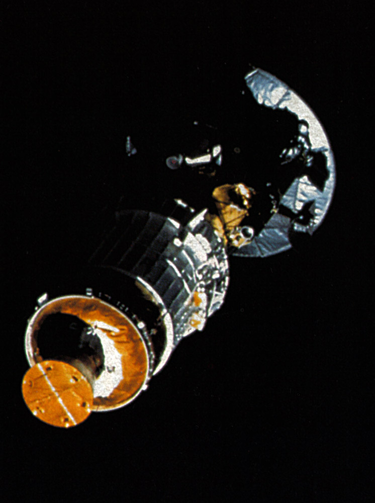 Real photograph of Galileo spacecraft attached to its upper-stage booster after deployment from Space Shuttle Atlantis in October 1989