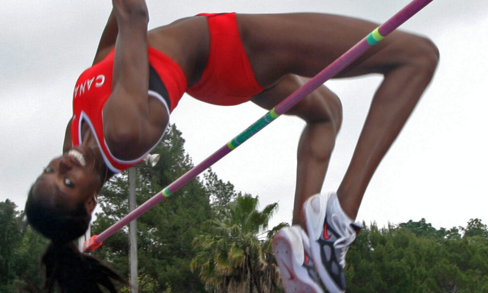 Canadian high jump athlete Nicole Forrester performing a high jump using the Fosbury flop technique