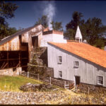 Historic cast house and iron furnace buildings at Hopewell Furnace National Historic Site in Pennsylvania