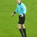 German soccer referee Harm Osmers on the pitch during a professional match