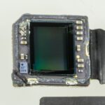 Close-up photo of an iPhone 6s rear camera module illustrating the photography format topic