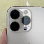 A real photograph of an Apple iPhone 16 Pro, illustrating iPhone network settings and Wi-Fi troubleshooting