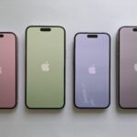 Apple iPhone photographed in front of a plain background, illustrating Screen Time settings