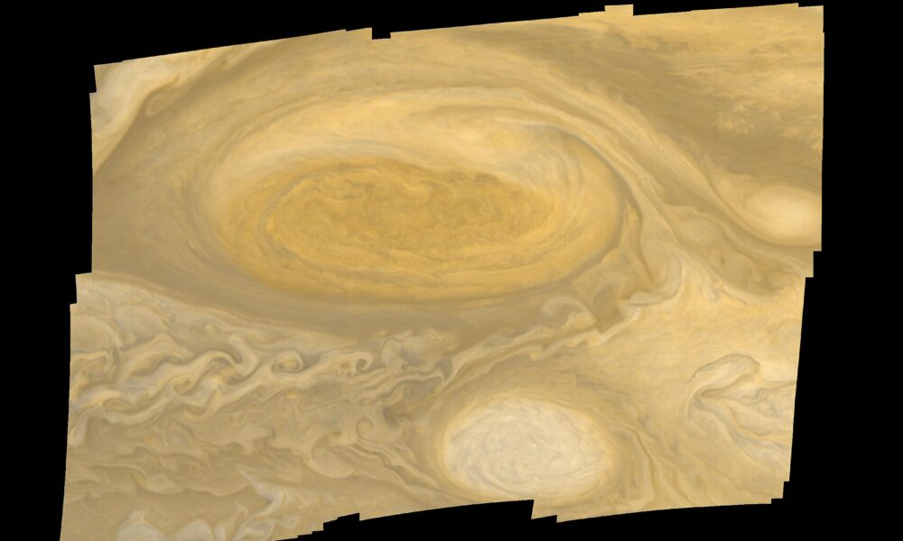 NASA Voyager 1 mosaic of Jupiter and the Great Red Spot used to illustrate Jupiter's mass compared with Earth
