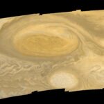 NASA Voyager 1 mosaic of Jupiter and the Great Red Spot used to illustrate Jupiter's mass compared with Earth
