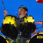 Lars Ulrich, who played competitive junior tennis in Denmark, performing with Metallica at Marvel Stadium in 2025