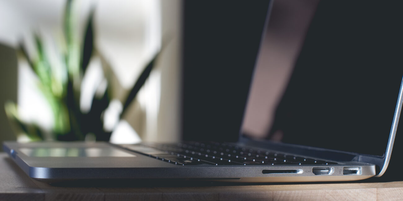 Real photograph of an Apple MacBook Pro laptop used for macOS screen recording