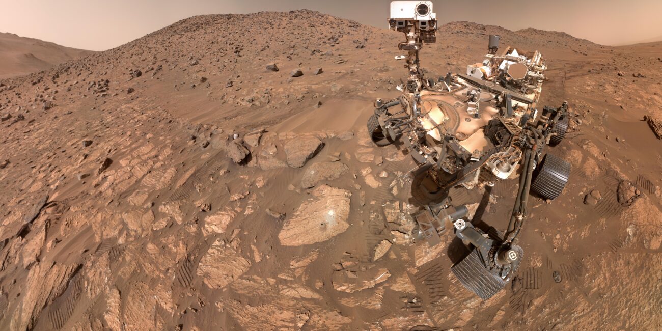Real 2024 NASA Perseverance Mars rover selfie beside Cheyava Falls rock on the Martian surface