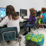 Students using Minecraft in an after-school classroom program