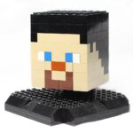 Minecraft-themed LEGO pixel-block head, illustrative image for a Minecraft hopper tutorial