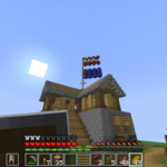 Minecraft Survival gameplay screenshot of a player-built wood-and-stone house with a pitched roof and exterior stairs