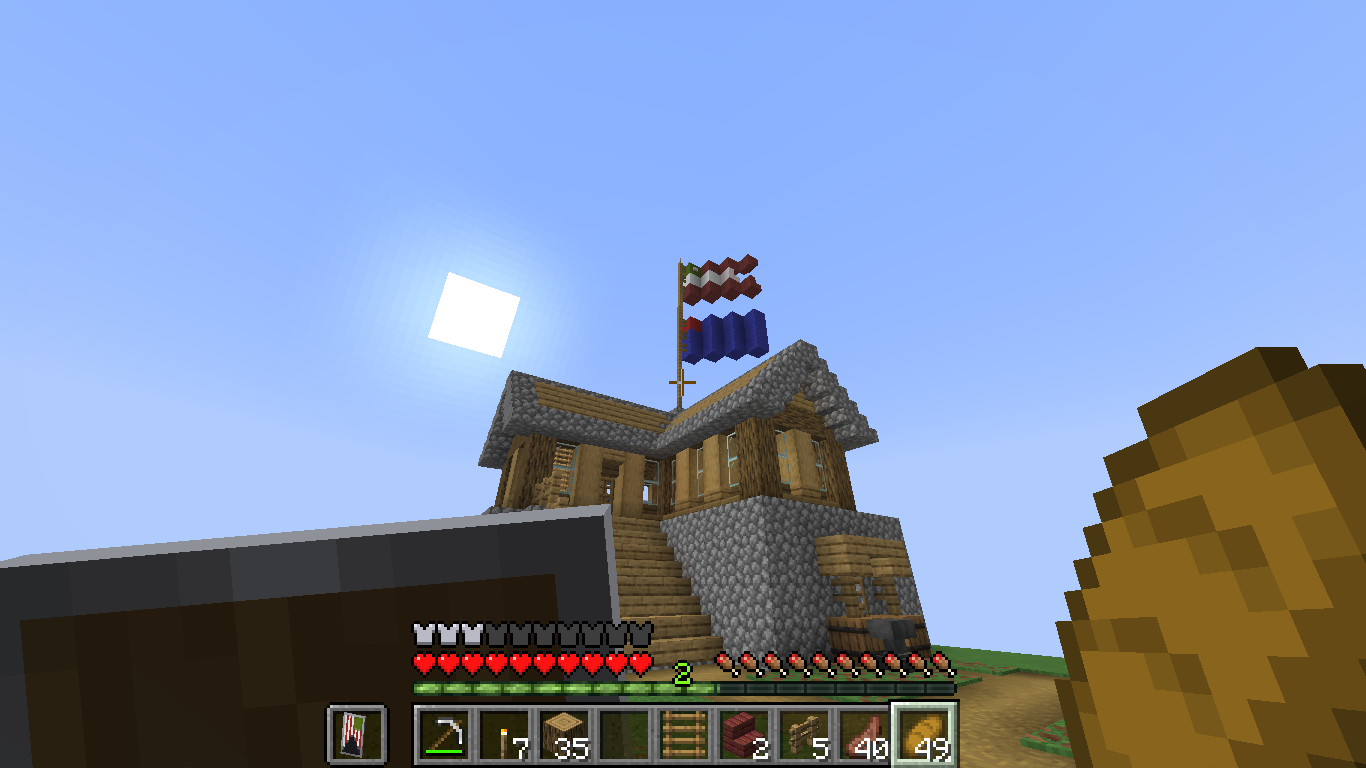 Minecraft gameplay screenshot of a player-built wooden house with a pitched roof