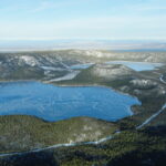 Archival aerial winter view of actual Newberry Caldera in Oregon, showing Paulina Lake, East Lake and the Central Pumice Cone