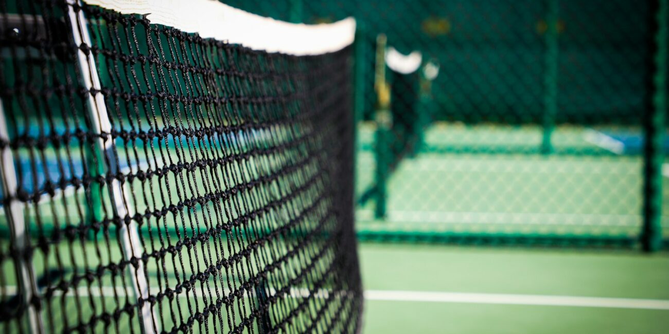 Real outdoor pickleball court in Saddlebrooke, Arizona, showing playing lines and net