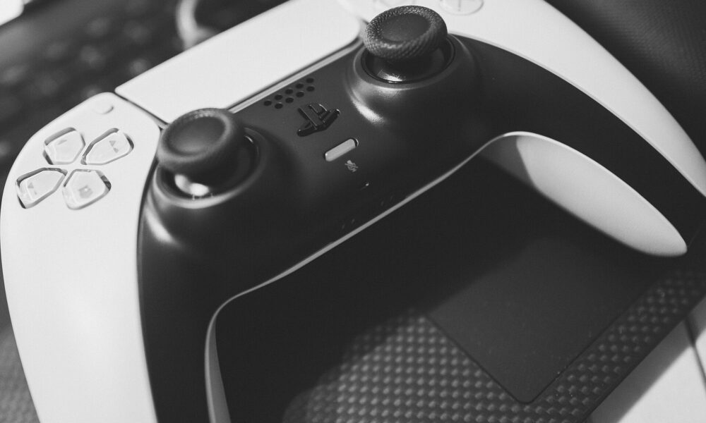 Real PlayStation 5 DualSense wireless controller photographed from above