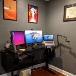 Photograph of a real computer and desktop home office setup