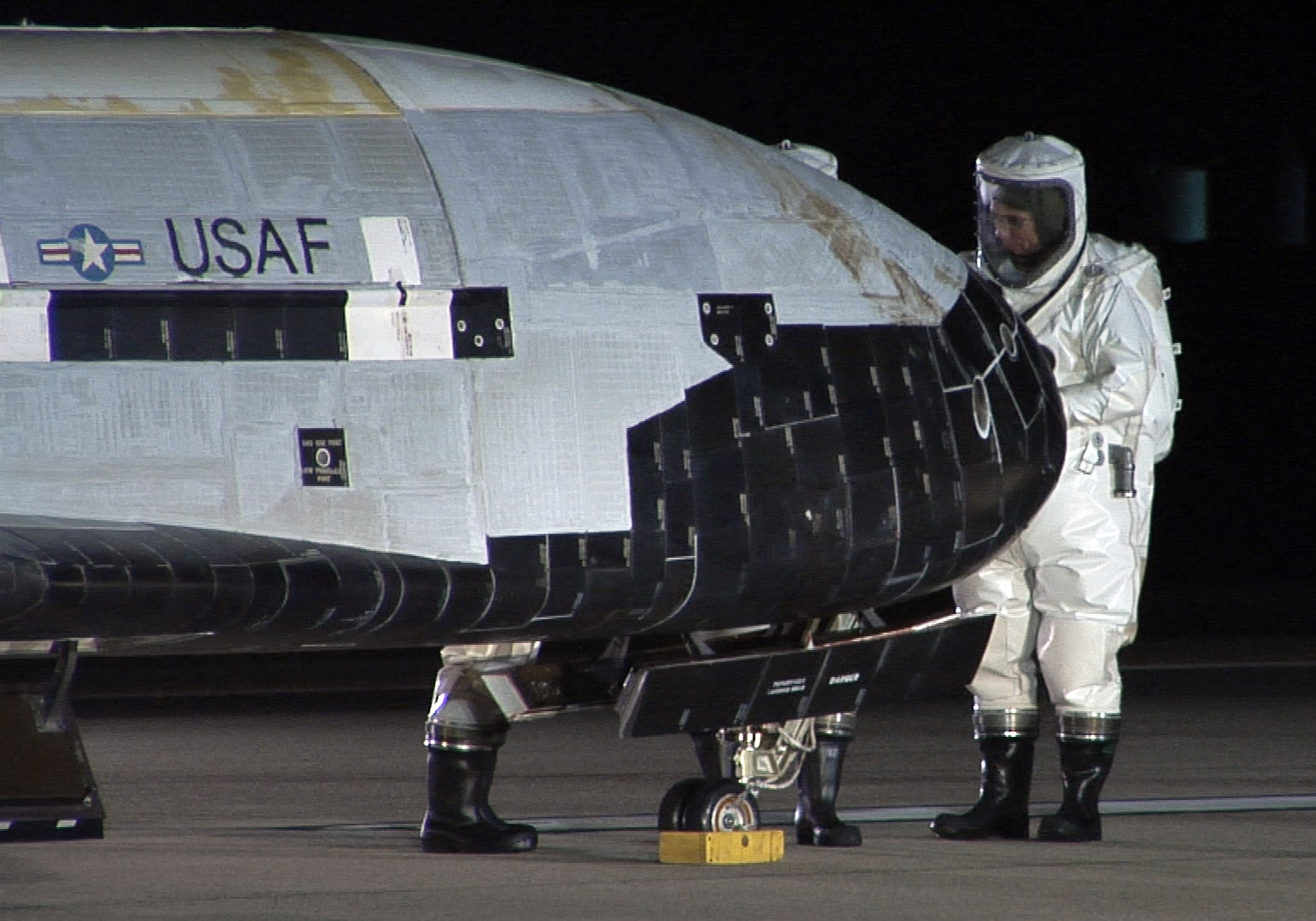 Actual X-37B spaceplane inspected after its first landing at Vandenberg in December 2010
