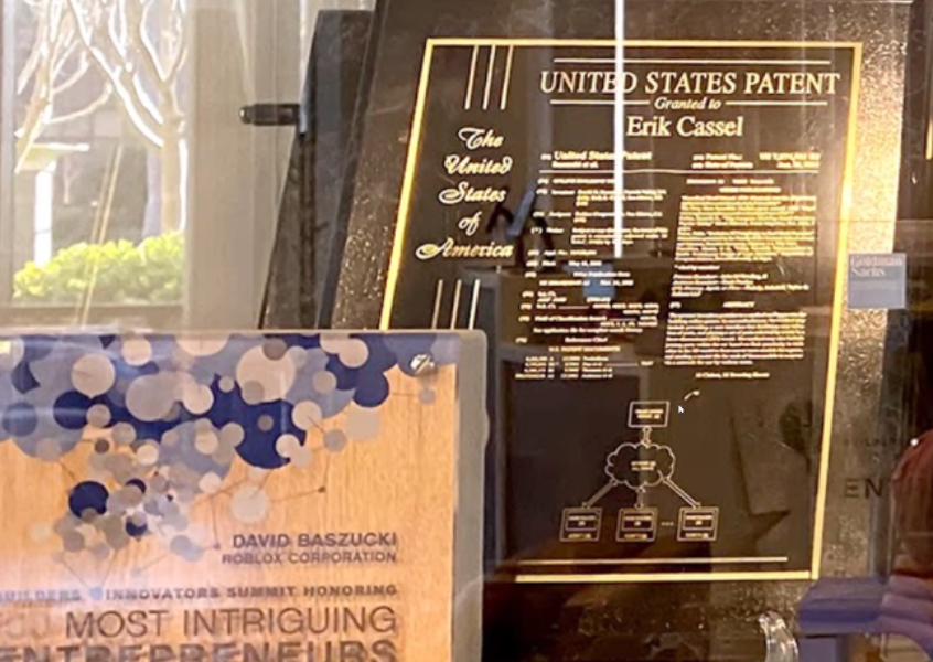 Real-world photograph of Roblox Corporation award on display at headquarters