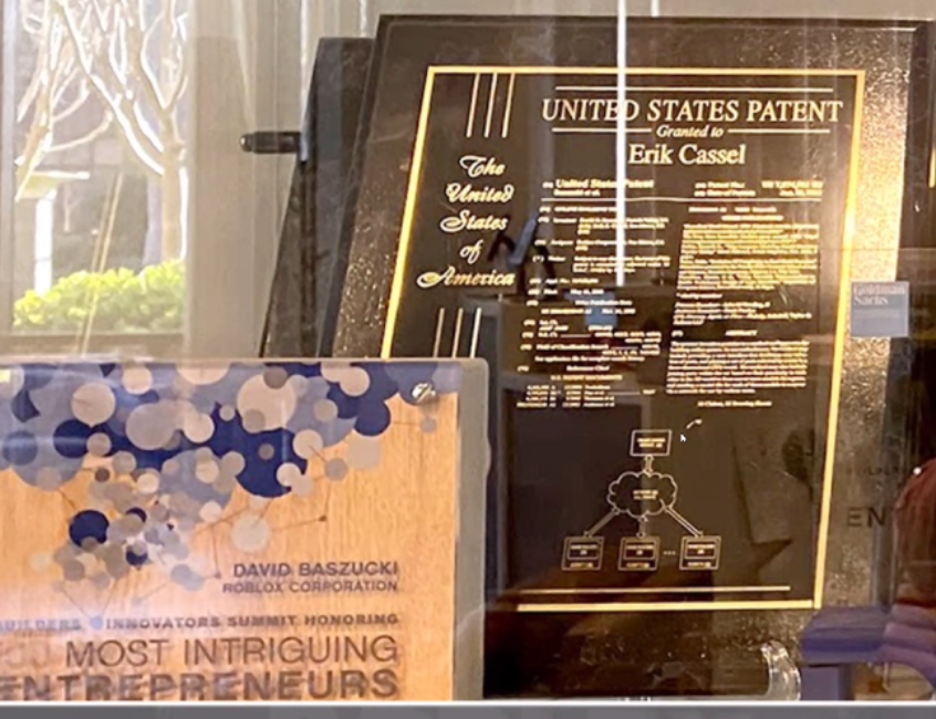 Real-world photograph of Roblox Corporation award on display at headquarters