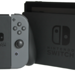 Nintendo Switch console and Joy-Con grip illustrating Roblox's lack of an official Switch app in 2026