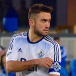 Pedro Morales adjusts his soccer captain's armband during a Vancouver Whitecaps match in 2015