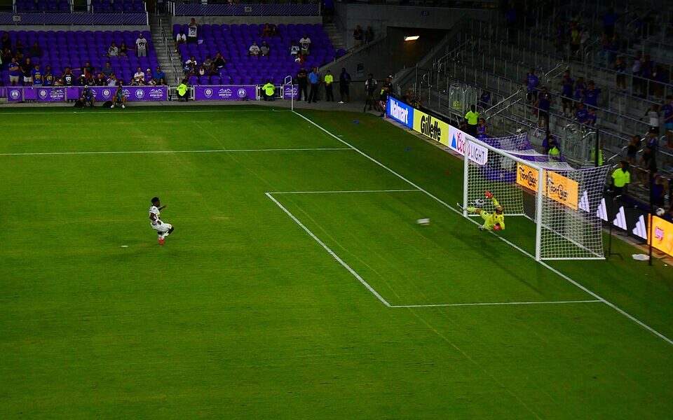 Footballer Alvaro Angulo taking a penalty kick in a 2025 Leagues Cup match