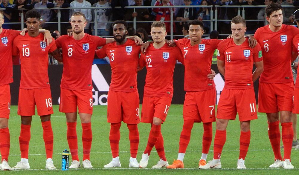 England players watch a penalty kick during the 2018 World Cup shootout against Colombia