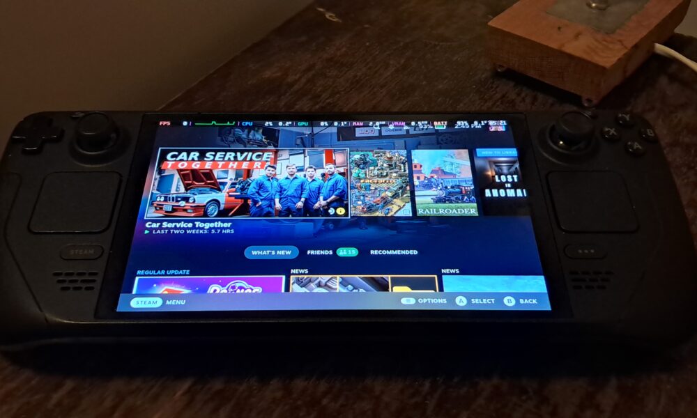 Real Steam Deck OLED handheld showing the home screen before factory reset