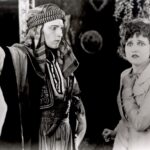 Rudolph Valentino as Sheik Ahmed and Agnes Ayres as Lady Diana in an actual scene from the 1921 silent film The Sheik