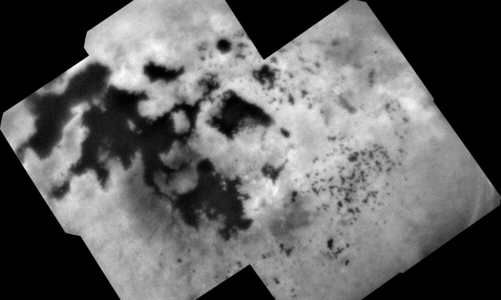 Actual NASA Cassini photograph of Saturn moon Titan north polar lakes and seas of methane and ethane through atmospheric haze