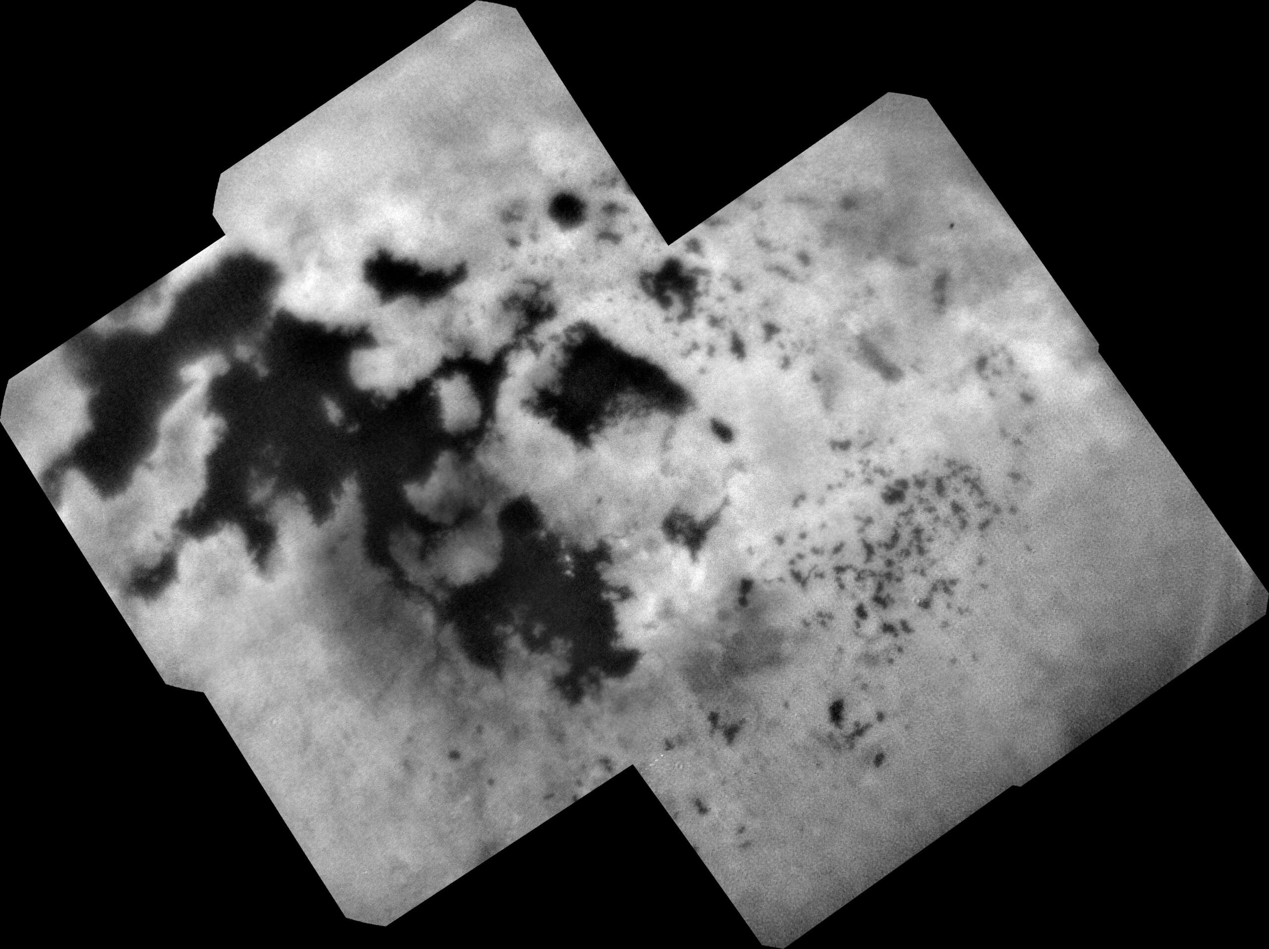 Genuine NASA Cassini image of Titan north polar landscape and hydrocarbon lakes observed through atmospheric haze